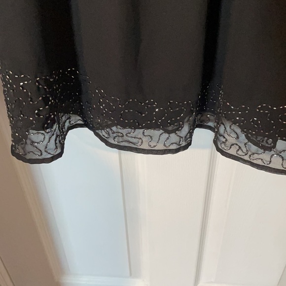 Black ae peephole dress. Super flattering. - Picture 2 of 5